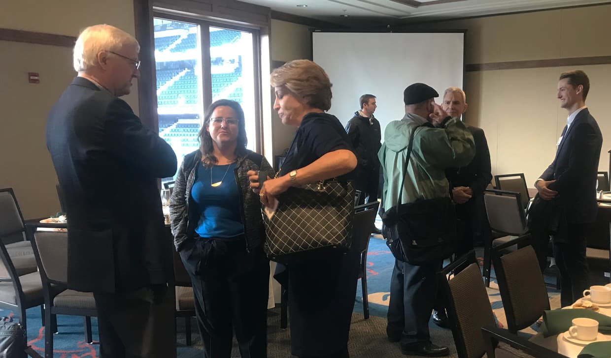 People having conversation in the room
