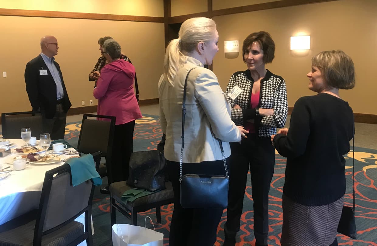 People having conversation in the room
